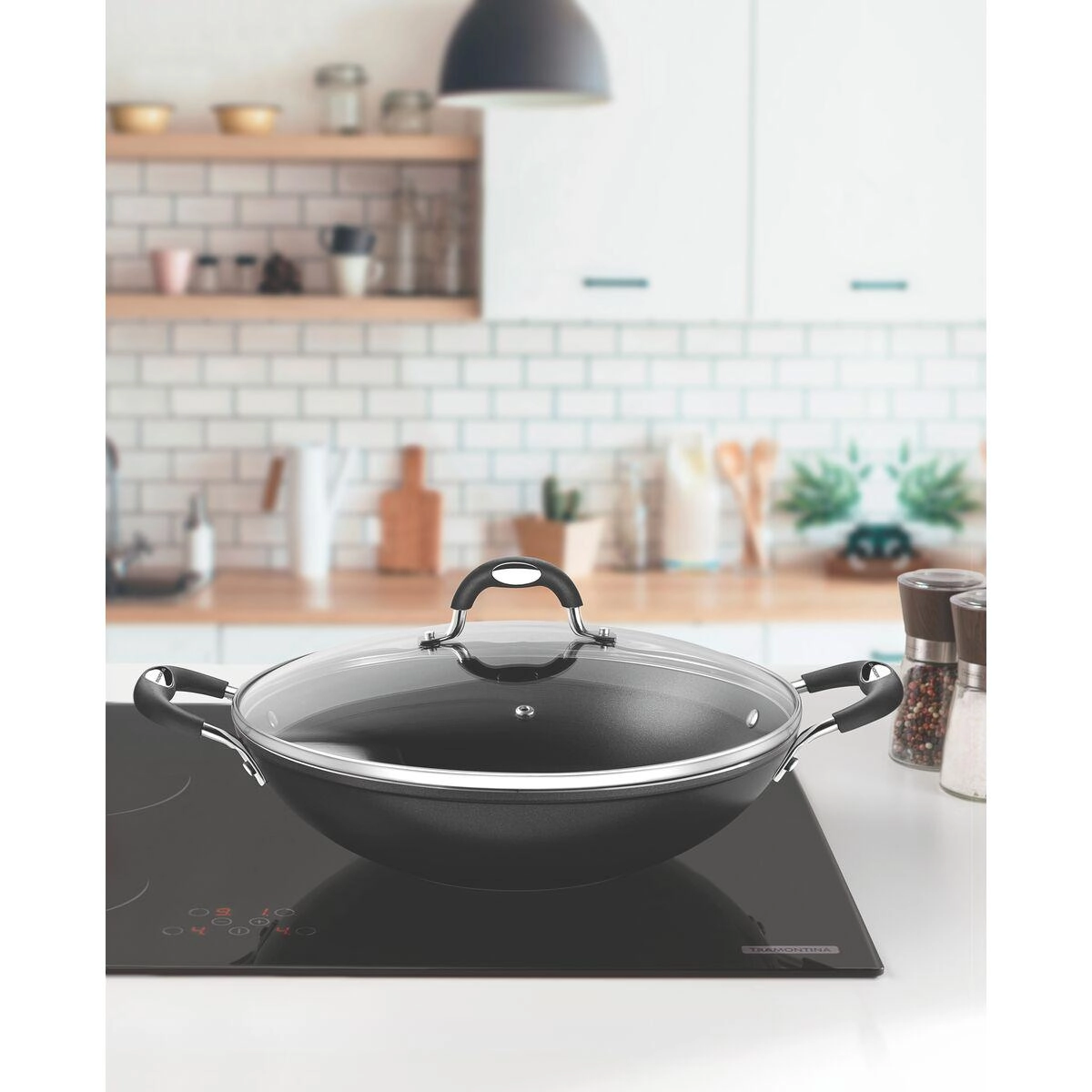 PANELA WOK 28708/032 MONACO INDUCAO PRETO 32CM 4,5LTS ALUMINIO C/ REV ANTIADERENTE TRAMONTINA